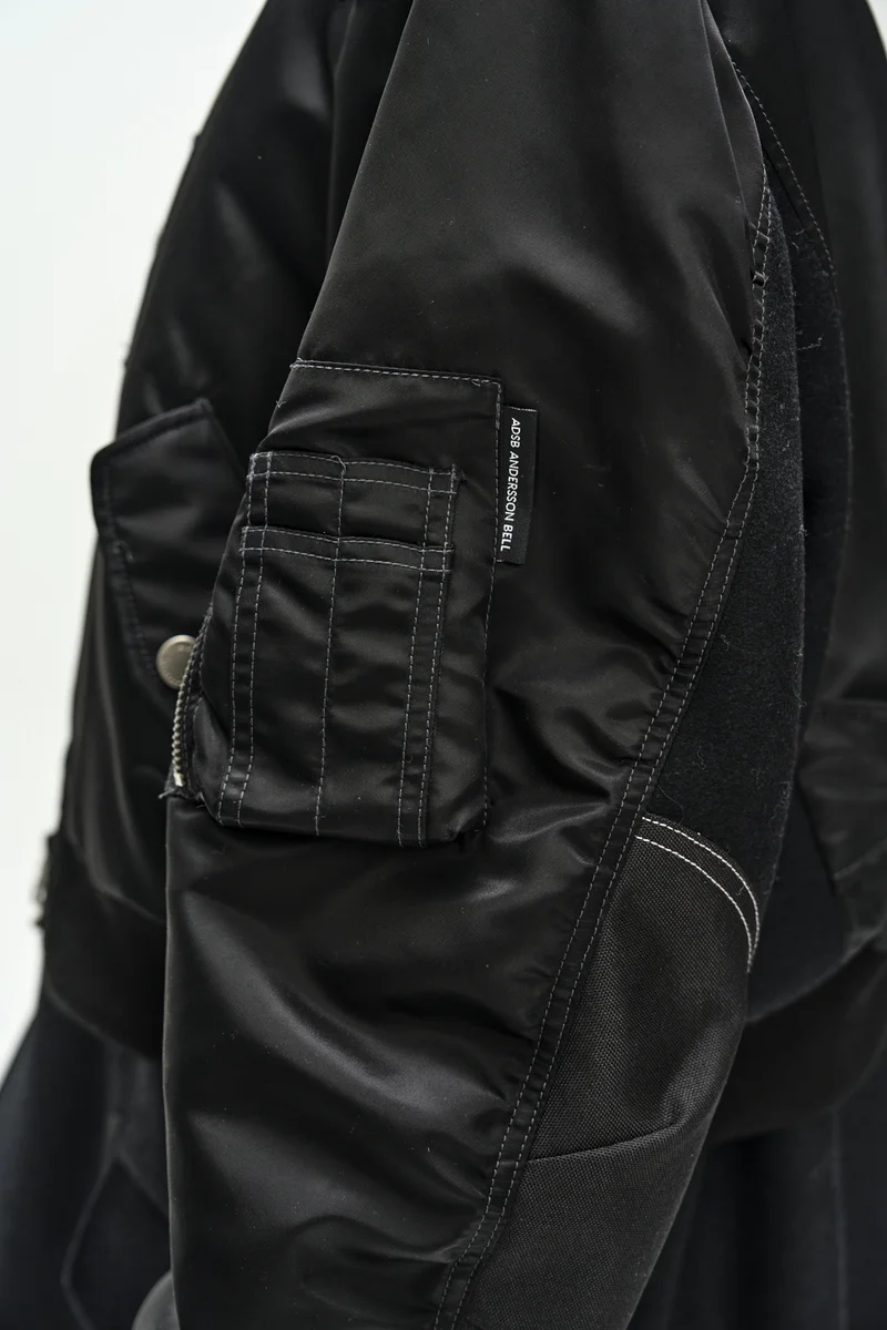 UNISEX DECONSTRUCTED LAYERED BOMBER COAT 11