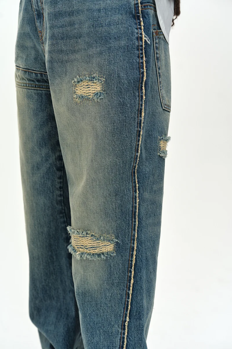 UNISEX RE-WORKED EMBROIDERY FLARE JEANS 7