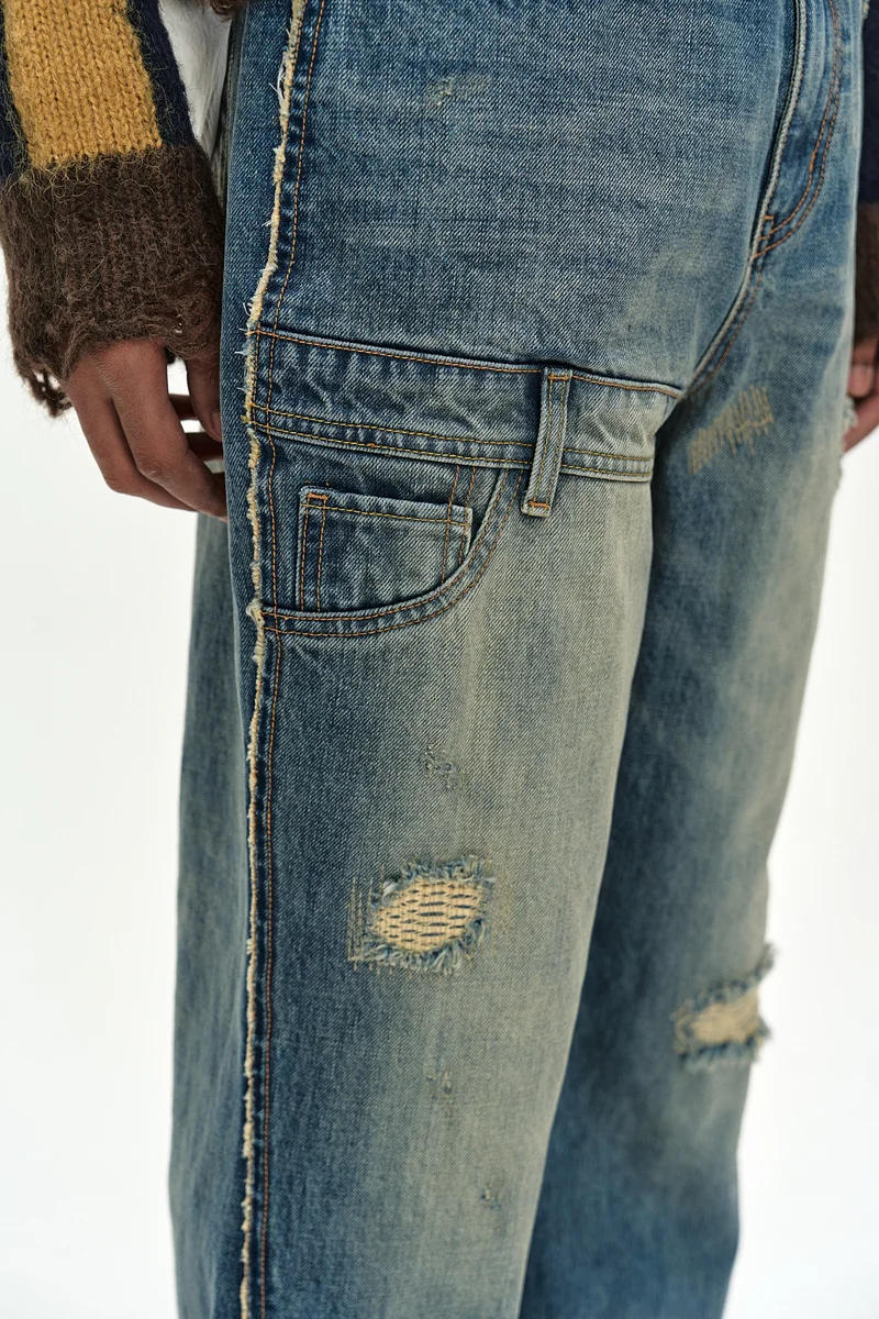 UNISEX RE-WORKED EMBROIDERY FLARE JEANS 8